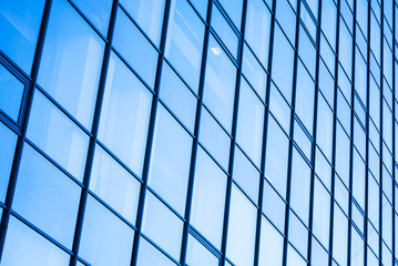 Moder office facade with blue glass ans steel frames