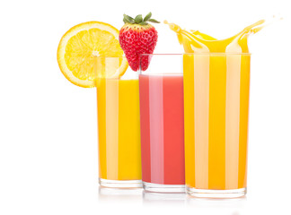 tasty summer fruit drinks in glass with splash