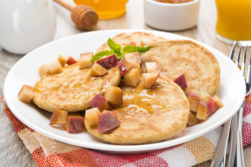 homemade pancakes with peaches and honey