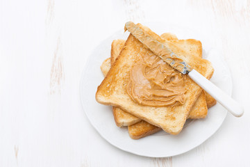 toasts with peanut butter, top view
