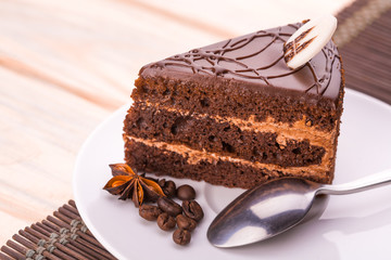 delicious chocolate cake and cup of coffee