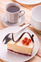 delicious cheesecake and cup of coffee