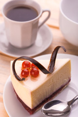 delicious cheesecake and cup of coffee