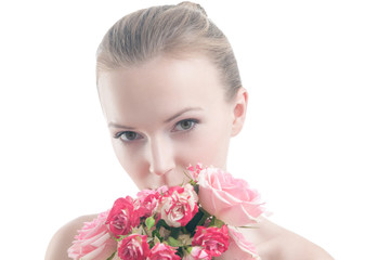 Beauty portrait of girl with bouquet of roses