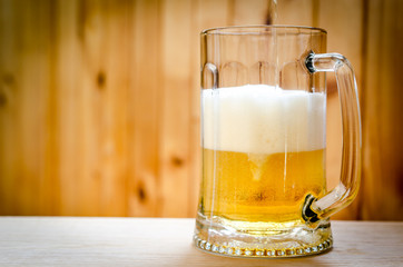 Beer pouring into mug