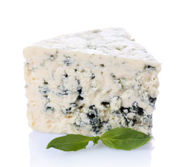 Tasty blue cheese with basil, isolated on white