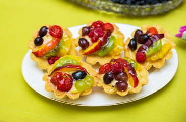 Tasty sweets in the plate