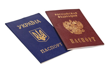 Ukrainian and Russian  passports isolated on white background