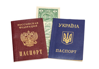 Ukrainian and Russian  passports isolated on white background