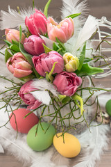 easter decoration with tulip flowers and eggs