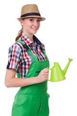 Young woman with watering can on white