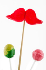 lollipop in the shape of red lips, shot on white