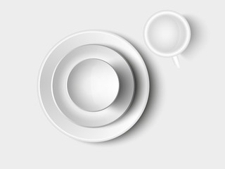 set of white dishes on a  table