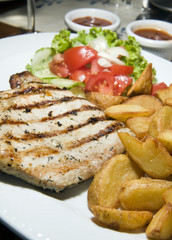 Polish style grilled pork chops meal as photographed in Krakow P
