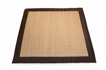 Bamboo straw serving mat isolated on white background
