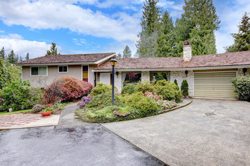 One story house with stone wall trim