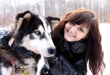Young woman and dog siberian husky