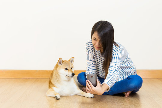 Asia Woman And Dog Selfie