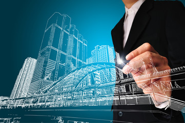 Business man or achitect draw the drawing of building or citysca