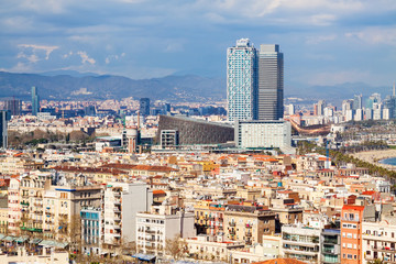 Fototapeta premium metropolitan area in cloudy day. Barcelona