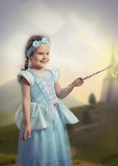 Girl with a magic wand in her hand, fairy tale landscape