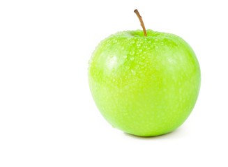 green apple with droplets of water isolated on white