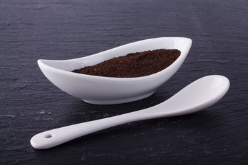 Coffee in a little white ceramic bowl