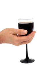 Verre de vin rouge en main