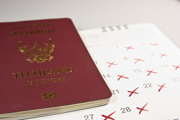 Passport and calendar holiday vacation.