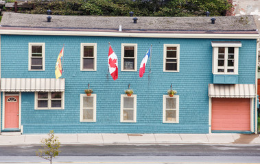 Blue Siding Building with Canadian Flag