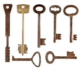 Set of old keys from door locks isolated on white background.