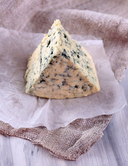 Tasty blue cheese on paper
