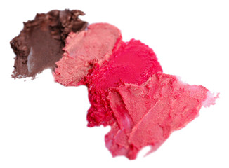 Collection of various lipstick smeared, isolated on white