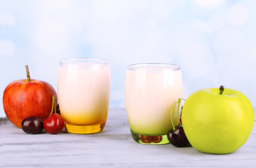 Delicious yogurt with fruits tastes in glasses and fresh fruits