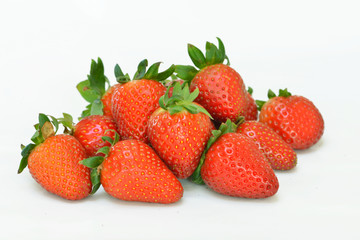 several strawberries on white background