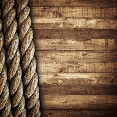 wooden background with rope