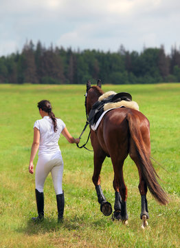 Groom Girl With Race Horse Walking Away