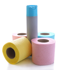 Colorful toilet paper rolls and air fresher, isolated on white