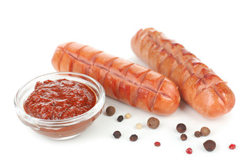 Grilled sausages isolated on white