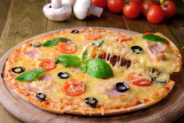Tasty pizza on table close-up