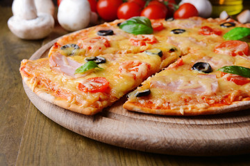 Tasty pizza on table close-up