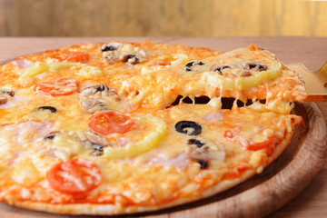 Tasty pizza on table close-up