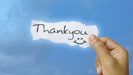Holding thank you message note