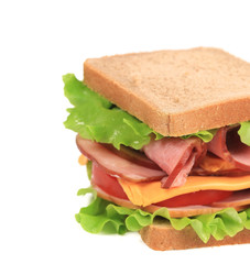 Sandwich with bacon and vegetables.
