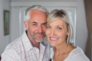 Close-up of a happy mature couple smiling