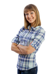 Obraz premium Happy Caucasian girl in shirt and jeans smiling
