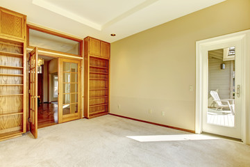 Empty office room with bookshelves