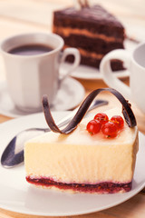 delicious chocolate and cheesecake with cup of coffee