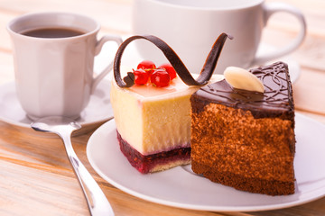 delicious chocolate and cheesecake with cup of coffee