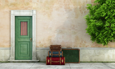 Fototapeta premium Old house with vintage suitcases